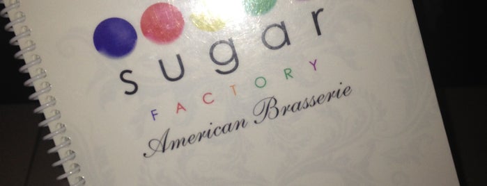 Sugar Factory American Brasserie is one of สถานที่ที่บันทึกไว้ของ Ashley.