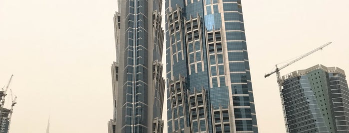 JW Marriott Marquis Hotel Dubai is one of Locais curtidos por MK.