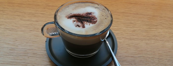 Café Nespresso is one of Orte, die Henry gefallen.