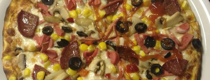 Pizza Uno is one of สถานที่ที่บันทึกไว้ของ Meltem.