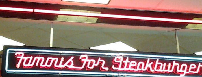 Steak 'n Shake is one of สถานที่ที่ Super ถูกใจ.
