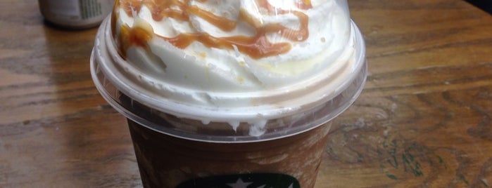 Starbucks is one of Tempat yang Disukai Genina.