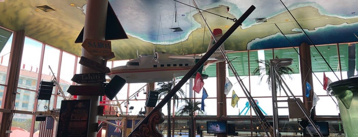 Jimmy Buffett's Margaritaville is one of Mike’s Liked Places.