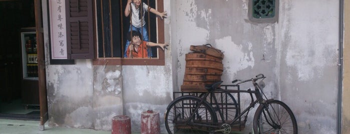 Penang Street Art : Boy and Girl Want Pau is one of Penang Street Art.
