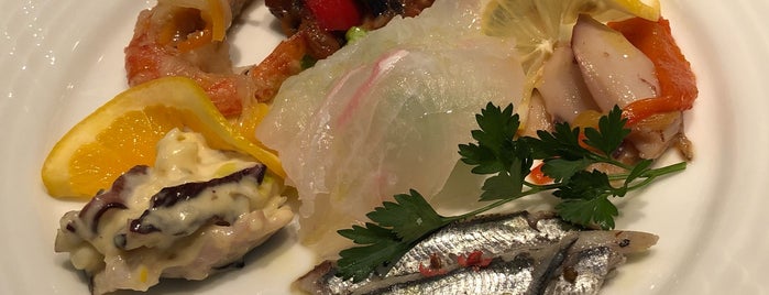 南イタリア魚介料理 ラ・スコリエーラ is one of Hideさんの保存済みスポット.