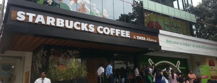 Starbucks is one of Orte, die Anil gefallen.