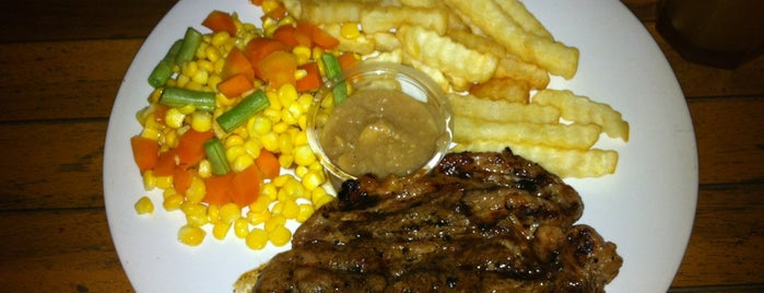 Andakar Ribs & Steak is one of Tempat yang Disukai Roes.