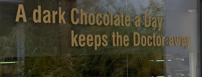 Swiss Chocolate Chalet is one of Orte, die Baha gefallen.