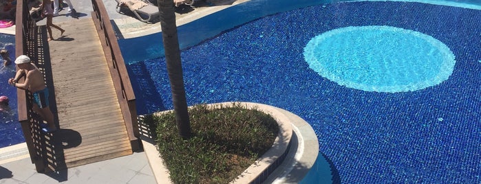 Long Beach Resort Pool Side is one of Orte, die Özden gefallen.