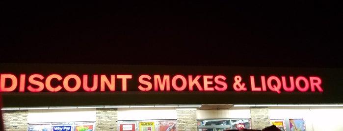 Discount Smokes & Liquor is one of Signage.