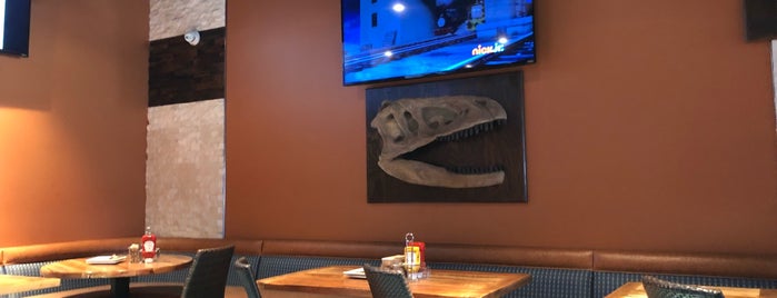 Pangea Dinosaur Grill is one of สถานที่ที่ Laurie ถูกใจ.