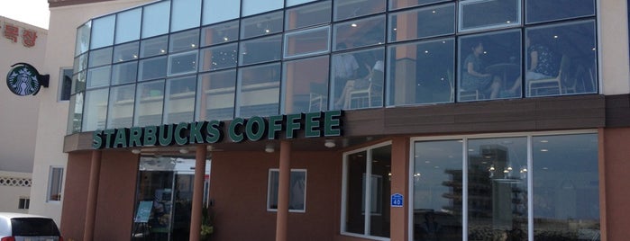 Starbucks is one of Tempat yang Disukai EunKyu.