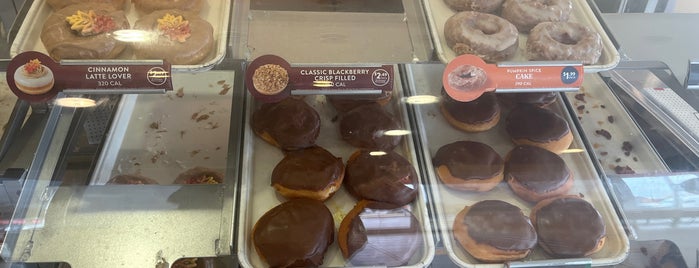 Krispy Kreme Doughnuts is one of Places I am at!.