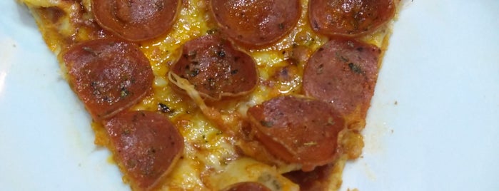 Domino's Pizza is one of Meus.
