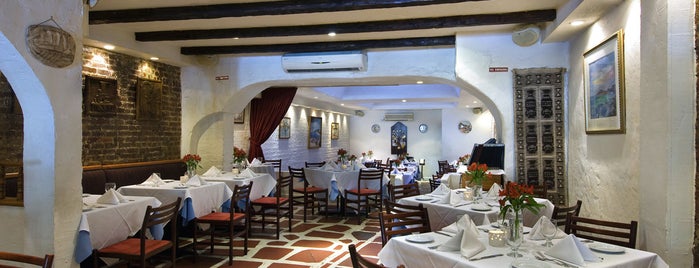 Ithaka Restaurant is one of Tempat yang Disukai Andrew.
