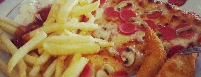 Pasaport Pizza is one of Locais curtidos por PıN@R.