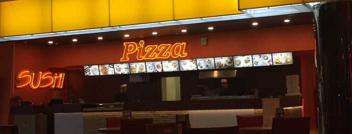 Pizza is one of Orte, die Tatiana gefallen.