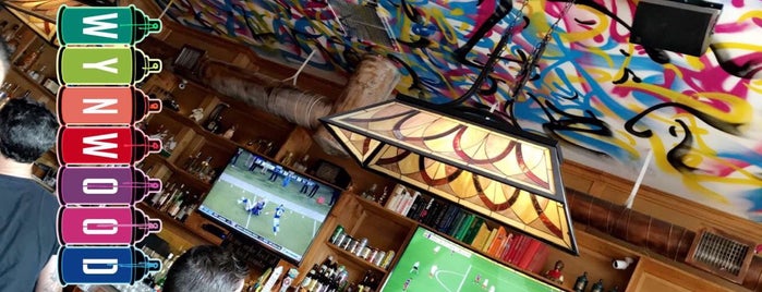 the bar next door is one of Lugares favoritos de gary.