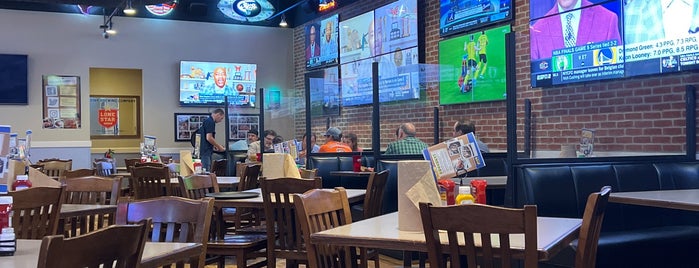 Pluckers Wing Bar is one of Locais curtidos por Mrs.