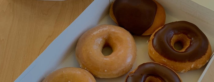 Krispy Kreme Doughnuts is one of Places to go.