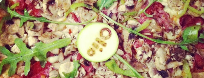 Olio Pizza is one of Tempat yang Disukai Леша.