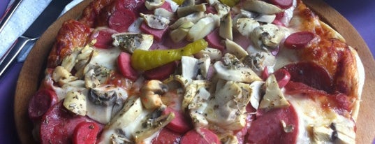 Dilim Pizza is one of Orte, die Bengi gefallen.