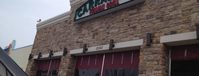 Carrabba's Italian Grill is one of Tempat yang Disukai Shawn Ryan.