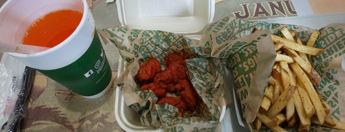Wingstop is one of Signage.
