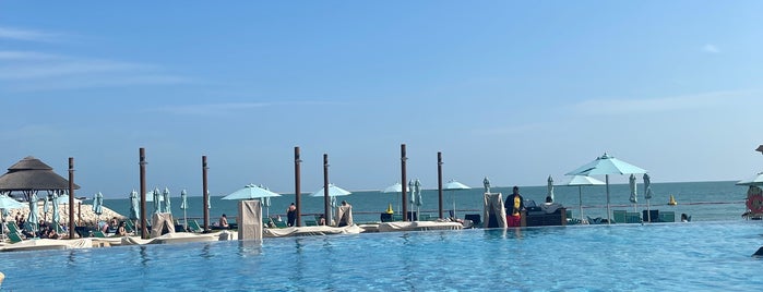 Pool Area @ Hilton Hotel is one of Doha.