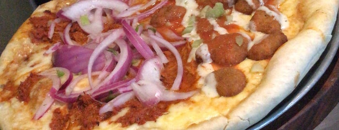 Pizza del Perro Negro is one of สถานที่ที่ Gabriela Gissel ถูกใจ.