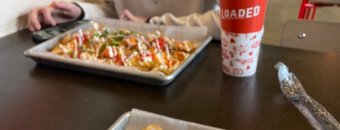 Loaded Elevated Nachos is one of St. Louis.