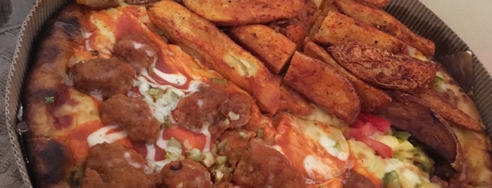 Pizza del Perro Negro is one of The 15 Best Places for Chilaquiles in Mexico City.