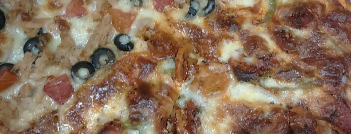 Joey's Pizza is one of International Adventures.