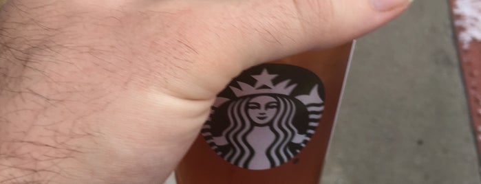 Starbucks is one of Andrew : понравившиеся места.