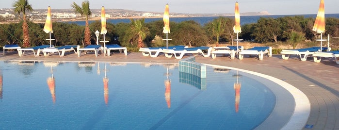 Asterias Beach Hotel is one of Places with Ira.