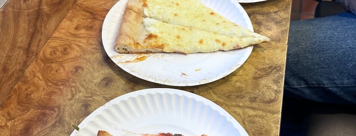 Famous Ray's Pizza is one of New Experiences.