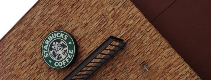 Starbucks is one of Orte, die Kevin' gefallen.