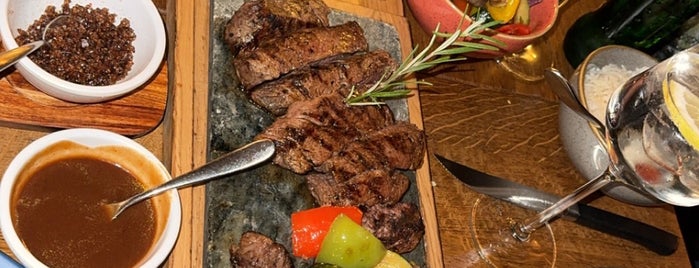 Simon's Steakhouse Grill & Restaurant & Bar is one of Posti che sono piaciuti a Nikos.