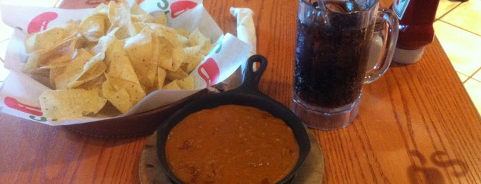 Chili's Grill & Bar is one of DRINKING out of town.