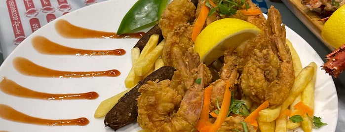 Al Mina Fish Resturant is one of Lugares guardados de Queen.