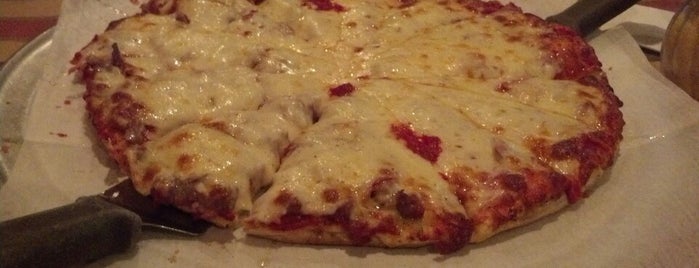 Pagliai's Pizza is one of Locais curtidos por Jason.