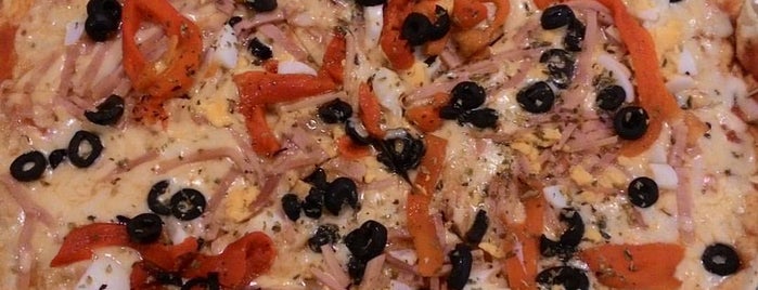 Pizzería La Pizza is one of Comida.
