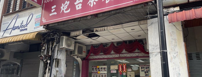 Trois Canon Cafe (三炮台茶餐厅) is one of Pulau Pinang.