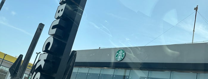 Starbucks is one of Locais curtidos por Nouf.