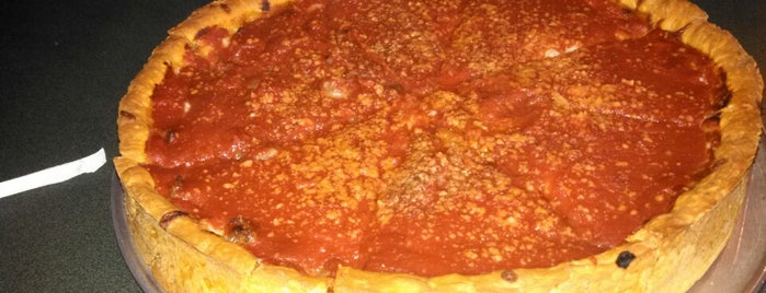 Beggar's Pizza is one of Lugares favoritos de Jeffery.
