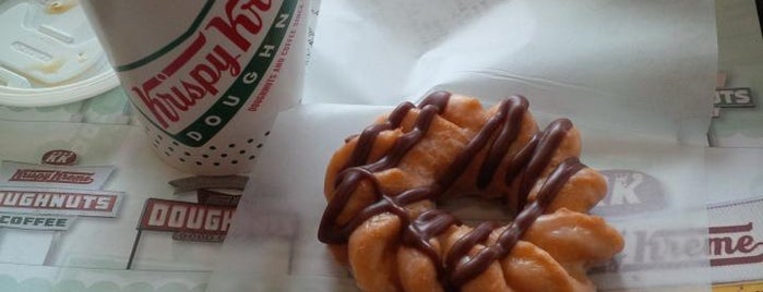 Krispy Kreme Doughnuts is one of สถานที่ที่บันทึกไว้ของ Happy.