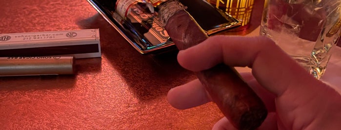SoHo Cigar Bar is one of Business Cards.