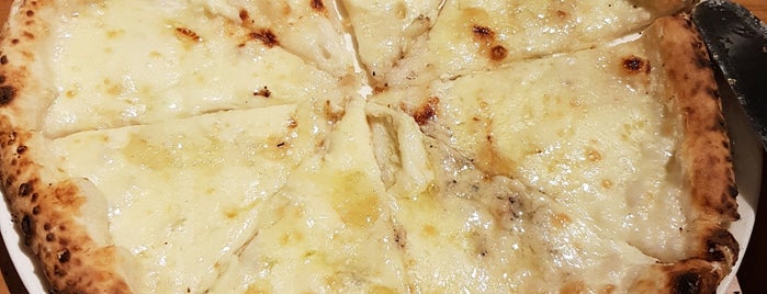 Pizza 4P's is one of Posti salvati di Yarn.