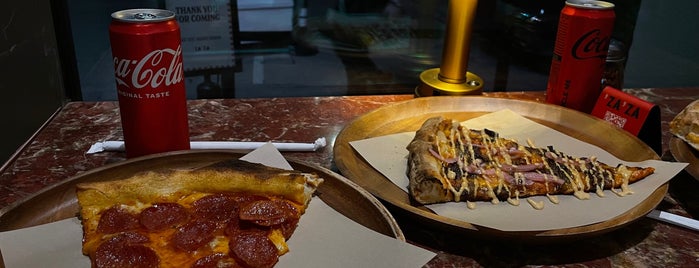 Za Za Slice is one of Dubai (Lounges & Outdoor places).