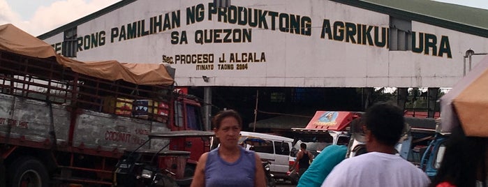 Sentrong Pamilihan ng Produktong Agrikultura ng Quezon is one of Agu'nun Beğendiği Mekanlar.